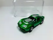 AFX tras CANDY GREEN CORVETTE AW Chassis & Display case Aurora NEW!