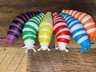 New Bundle Of 6 Different Colors Of Fidget Toy Slug. Free Gift With Purchase