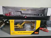 First Gear Peterbilt Lowboy With Cat374D L excavator 1/50 scale New In The Boxes
