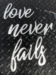 Love Never Fails Words Metal Wall Art Accents Polished Steel - Size Varies