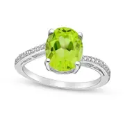 Oval Peridot and Natural Diamond Accent Ring in Sterling Silver