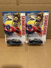 LOT OF 2 / 2024 Hot Wheels TRANSFORMERS Bugatti Veyron 4/5