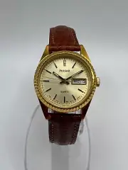 Pulsar Goldtone won Watch with a Day/Date Indicators, New Battery and New Leath