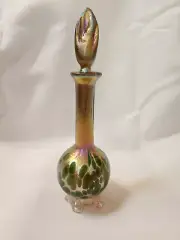Gold Luster Perfume Bottle With Green Spot Design.