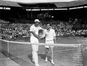 Tennis Geoff Brown congratulates Yvon Petra on winning the final, - Old Photo