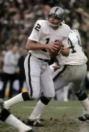 Quarterback Ken Stabler Oakland Raiders drops back to pass at an - 1976 Photo 1
