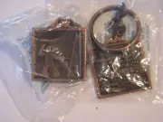 TWO METAL FENCING KEY TAGS KEYCHAINS