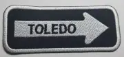 TOLEDO Oneway Arrow Embroidered Patch Iron on aprox 1.25x4"