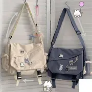 Buckled Messenger Bag With Penguin Charm - Black - One Size