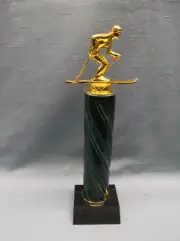 cross country ski female cast metal topper turned wood column black marble base