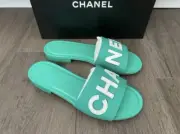 CHANEL CHA NEL LOGO GREEN LEATHER FLAT SHOES SLIDES MULES 37.5
