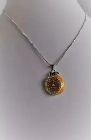 KIRKS FOLLY ORANGE SLICE NECKLACE IN SILVER TONE