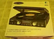 Jensen 3 speed stereo turntable with mp3 encoding system / am/fm stereo radio