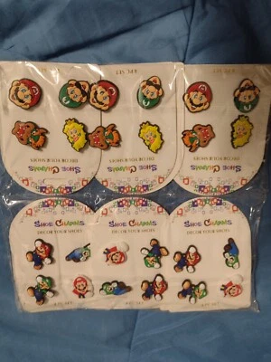 LOT OF 24 SUPER MARIO BROS SHOE CHARMS NIP SEALED BRAND NEW