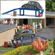 Busch 1/87 HO Scale VW Old Beetle+Mechanic+Oil Change Ramp+Barrels (Action Set)