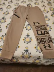 $110...Under Armour Unstoppable size L Joggers Beige. "Protect This House"