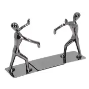 A Pair Of Black Humanoid Hand-pushed Books Standing Bookends Leaning On Booksh
