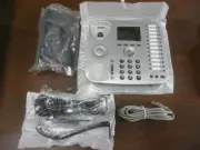 New-In-Box Silver Linksys One PHM1200 24 Button VoIP Phone
