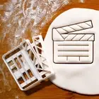 Director Clapboard cookie cutter film Filmmaking production producer biscuit