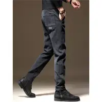 在飛比找ETMall東森購物網優惠-歐洲站黑灰色斜口袋秋季牛仔褲