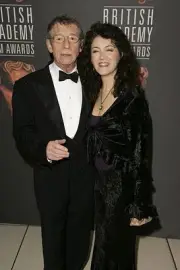 John Hurt Ann Rees Meyers arrive Orange British Academy Film Award- Old Photo