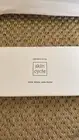 Skin Cycle 100% White Jade Roller. New With Box.
