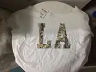Organic Cotton Plain T-Shirt Says LA On Front Of Shirt