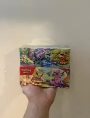 IN HAND Pokemon Prismatic Evolutions Mini Tin DISPLAY Box 8 Tins Factory Sealed