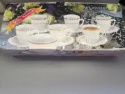 Allied Design 12 pc Porcelain cup and saucer set.