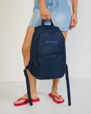 [Rip Curl] Rip Curl Evo 18L Backpack in Navy/Gold One Size Navy/Gold