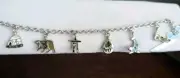Vtg Storrs Glacier Pearl Abalone Animal Charm Bracelet Alaska Bear Igloo Silver