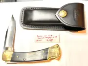 Buck no 110 USA 95mm long blade folding pocket knife with leather case Unused