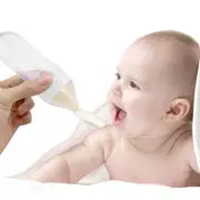 Baby Silicone Squeeze Feeding Bottle With Spoon Food Rice Cereal Feeder Tool BY