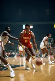 Elmore Smith Cleveland Cavaliers looks to drive on Bob McAdoo New - Old Photo