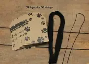 50 Pre-Punched PAW PRINT Hang Tags with Strings for Attaching