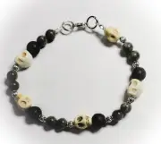 Lava Rock & Yooperlite Glow UV Stones With White Howlite Skulls Bracelet