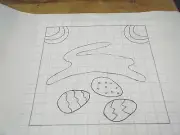 Prim rabbit and eggs rug hooking pattern on gridded trace fabric backing ready