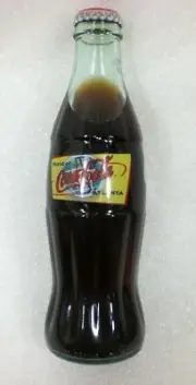 1999 Coca-Cola 8 oz Commemorative Glass Bottle World of Coke ATLANTA