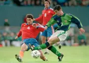 Keith Gillespie of Northern Ireland is challenged by Sargis Hovsep- Old Photo