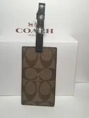 COACH Signature Luggage Tag Mahogany F77590 NWT. Comes with a Coach Gift box.