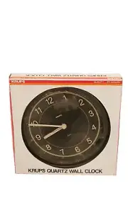 KRUPS Quartz Wall Clock 955 NEW In Box. Outer plastic of the box has a hole