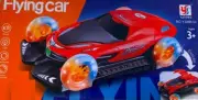 LIGHT UP SPINNING FLYING GULL WING DOOR CAR moving wheels & doors move W/MUSIC