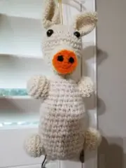 Handmade white pig. Amigurumi. Crochet stuffed toy