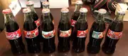 (10) New Santa Clause Christmas Coke Bottles (Various Years / Different Bottles)