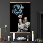 Girl and blue flower Canvas Print