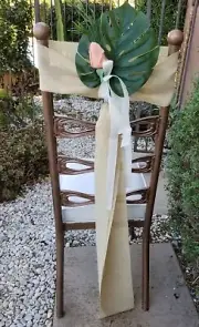Wedding Chair Pew Decorations Real Touch flowers and foliage with burlap wrap.