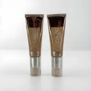 2 PACK Revlon Candid Glow Moisture Glow Anti-Pollution Foundation #210 NEW