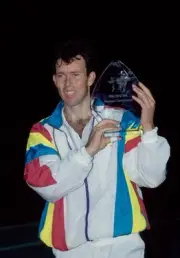 British tennis player Jeremy Bates poses with the trophy after win- Old Photo