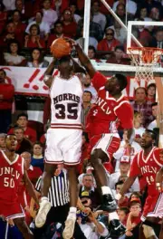 Larry Johnson defense vs Arkansas Isaiah Morris at Barnhill Arena - Old Photo