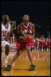 Forward Tyrone Nesby UNLV Rebels moves the ball as Fresno State Bu- Old Photo
